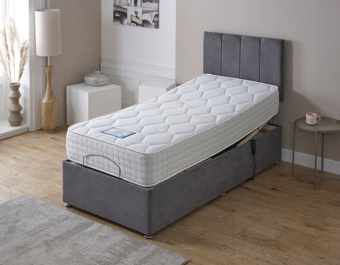 Customer relaxing on an adjustable bed